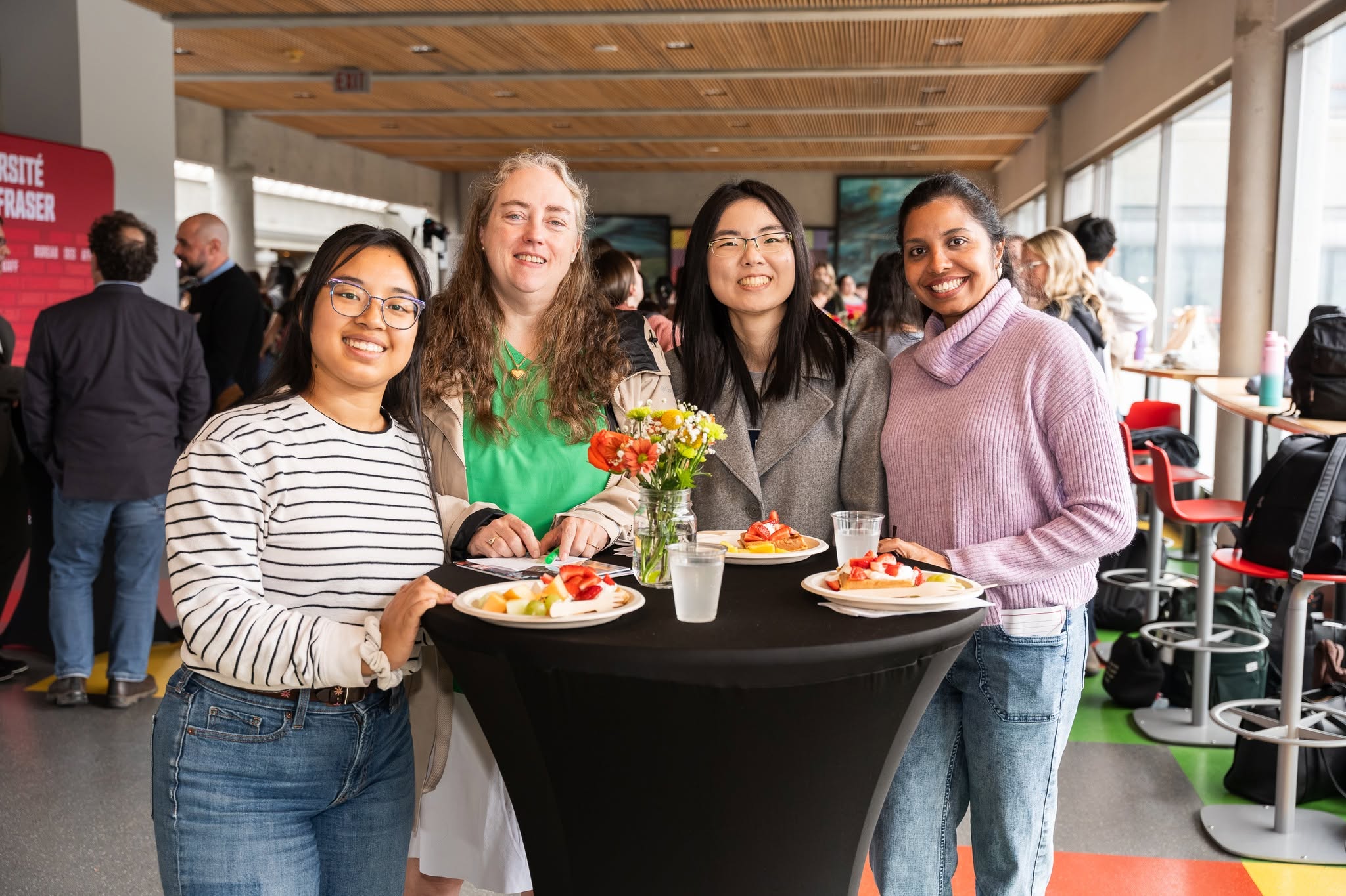 Sandani with SFU Faculty of Education colleagues at an event